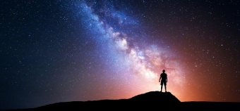 Milky Way. Night Sky With Stars And Silhouette Of A Man